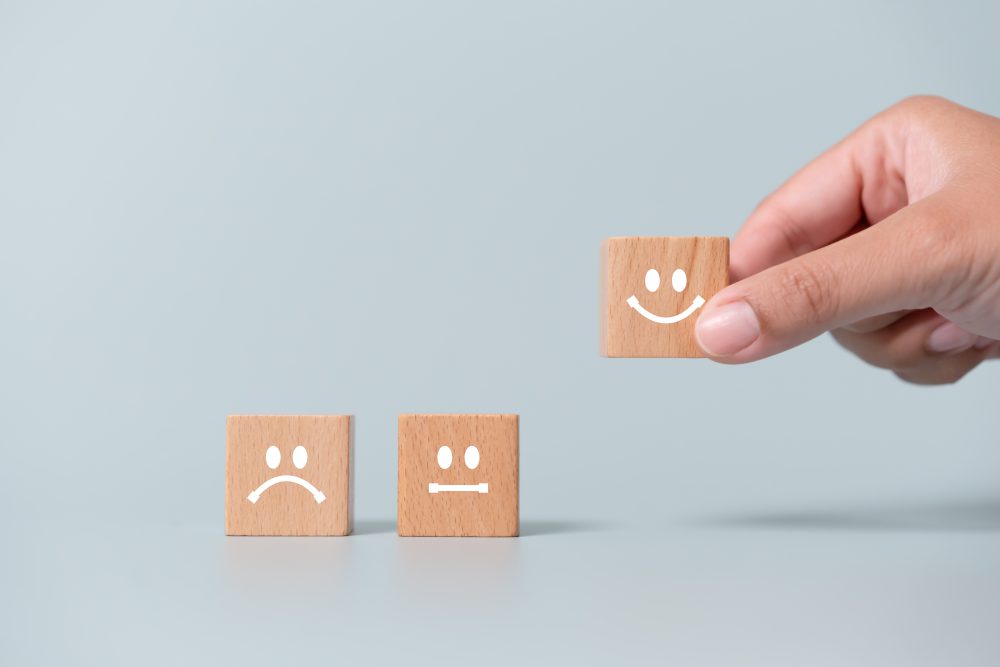 Concept of customer satisfaction review. Customer choose best rank with smiling face.