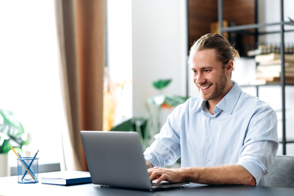 man guy freelancer stylish caucasian online laptop chatting